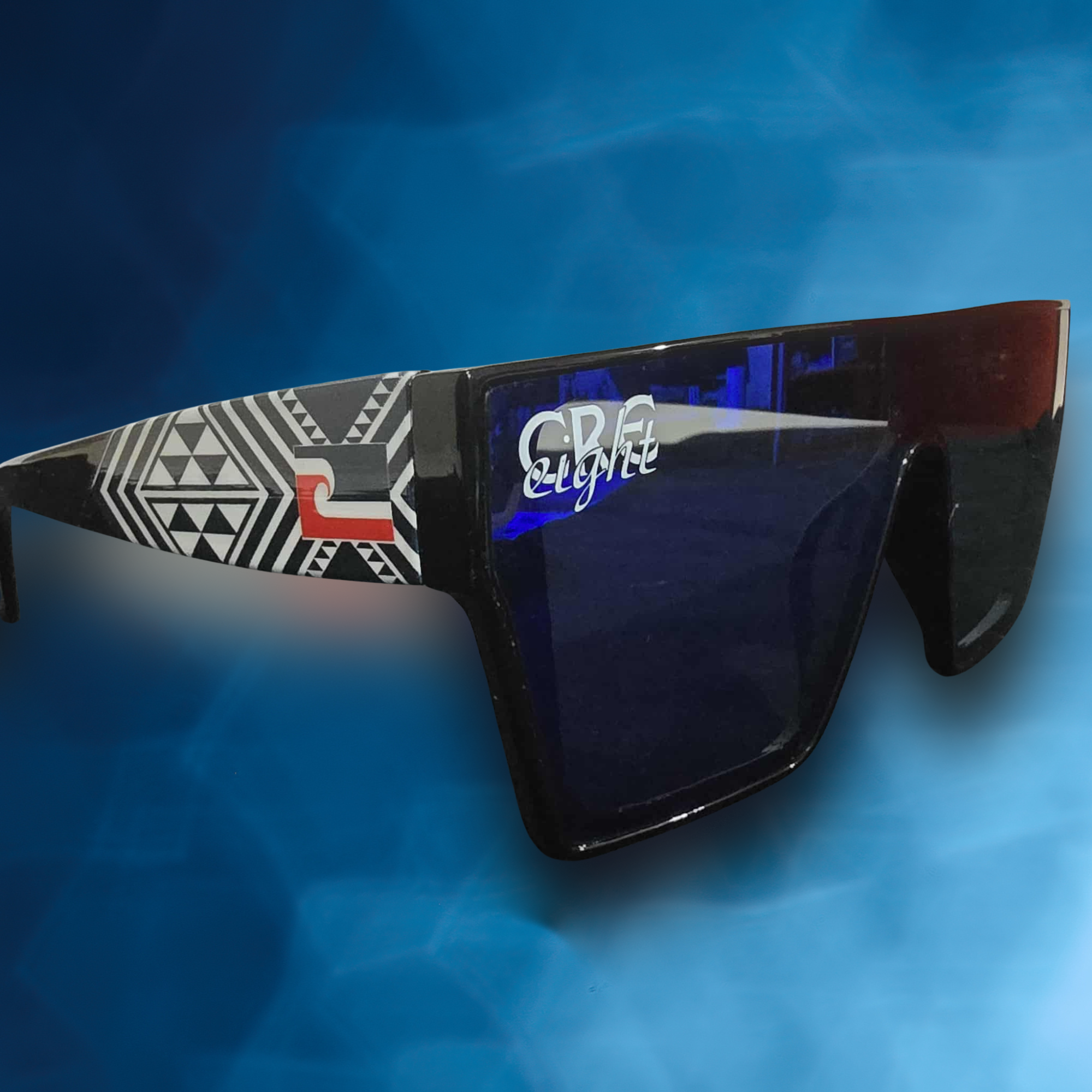 “CRE-eight Tāniko Sunglasses – Black Frame with UV-Printed Tribal Design”